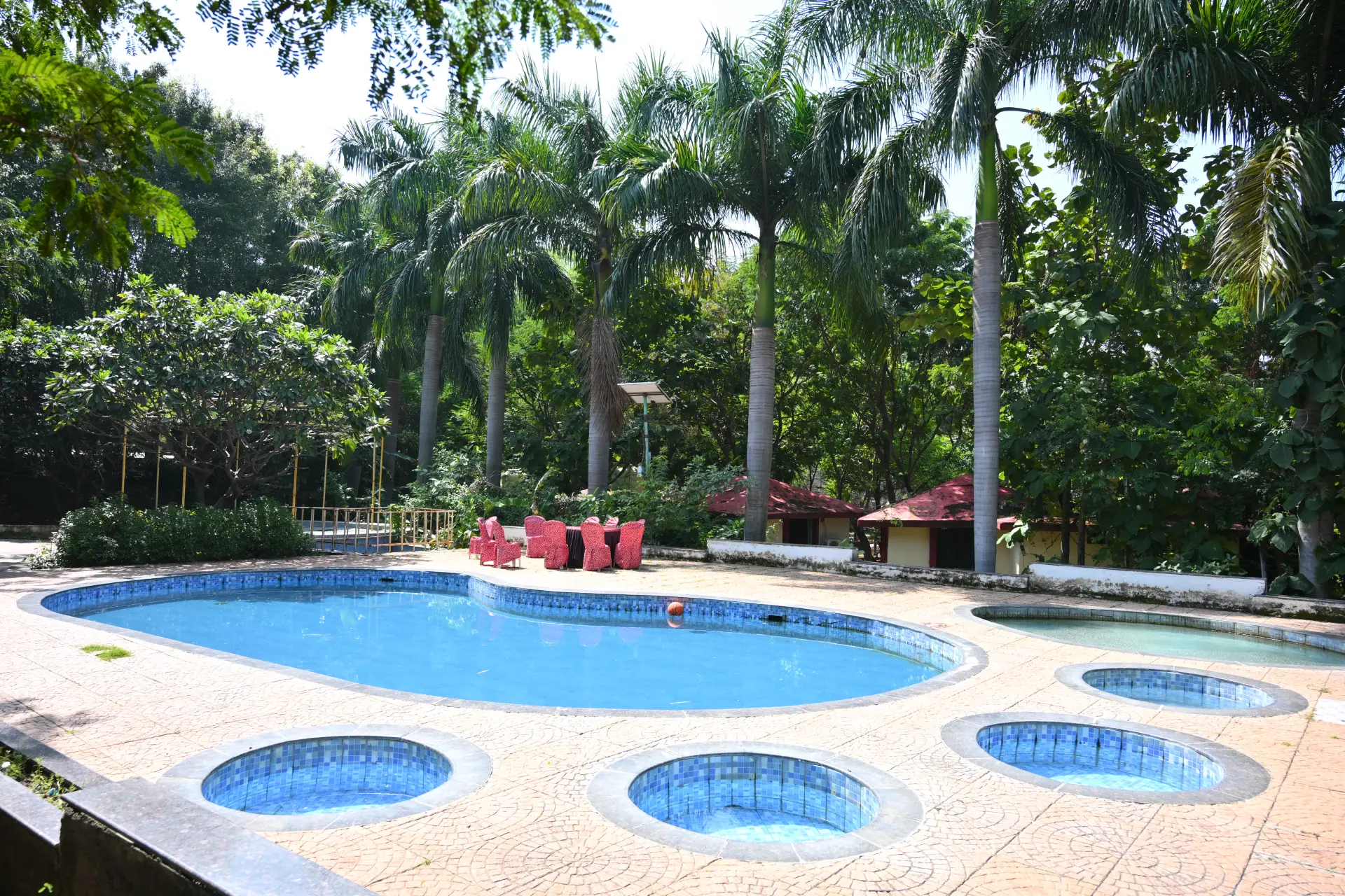 A farmhouse in a field.