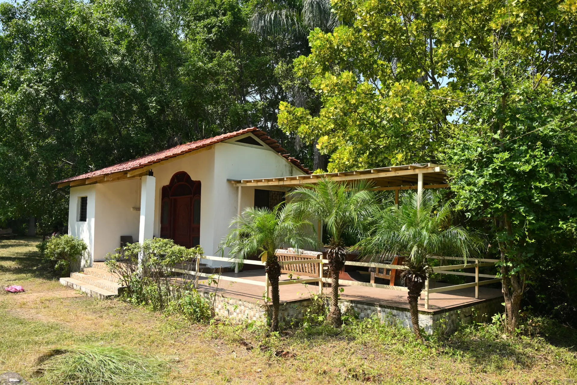 A minimalist bedroom with a large window in a modern villa.